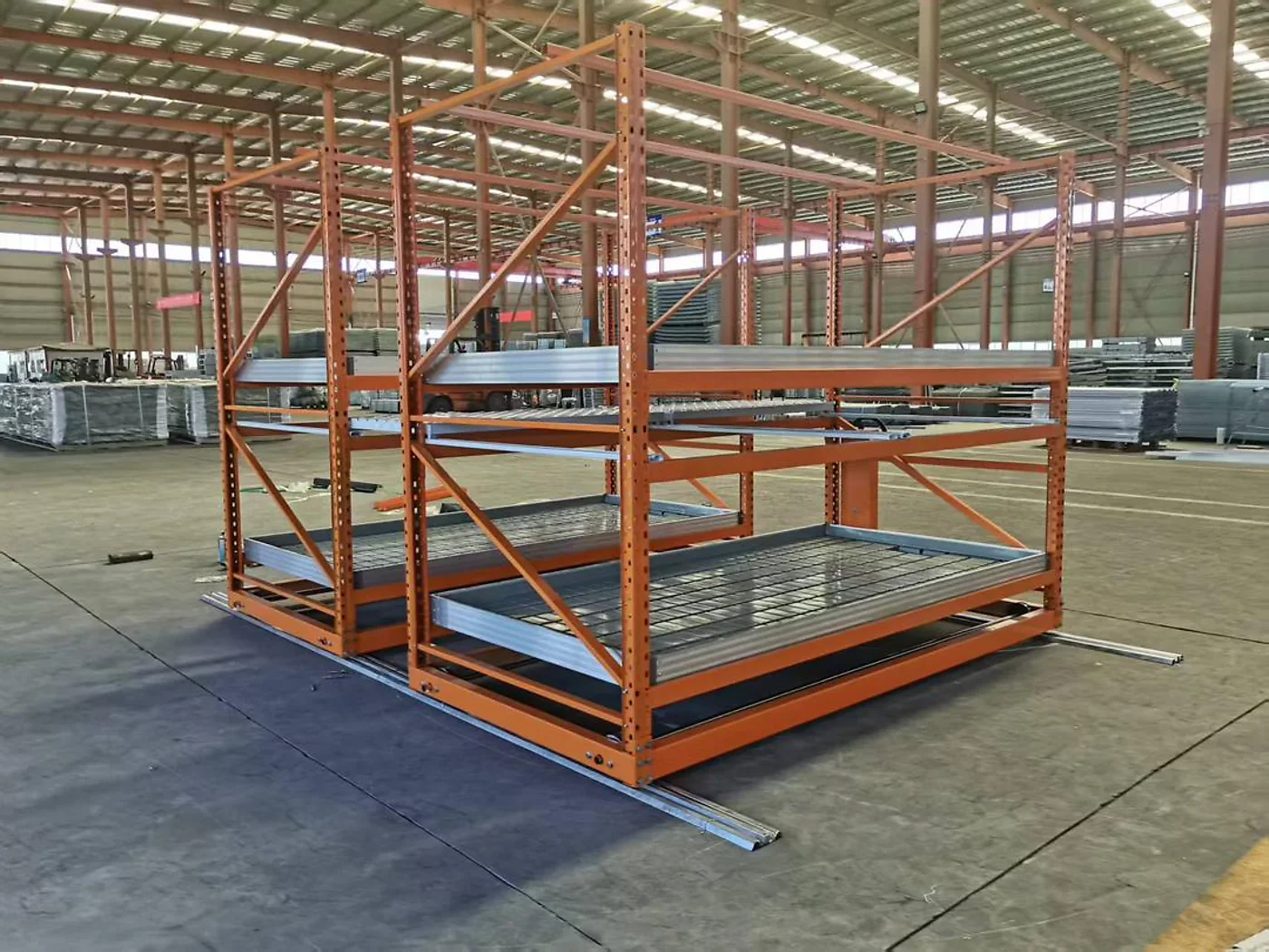 Custom multi-tier rolling vertical grow rack on aluminum tracks