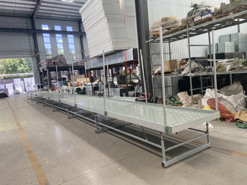 Flexstar Benching with Tracks — Fixed-rail cultivation tables