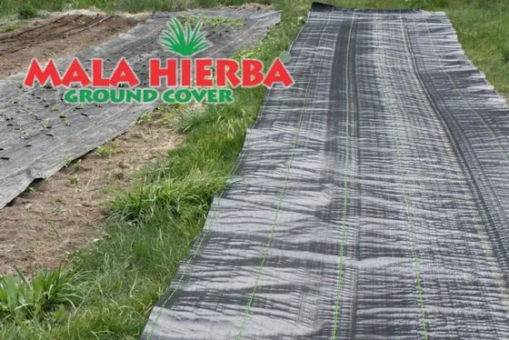 MALAHIERBA ground-cover weed barrier running down a row